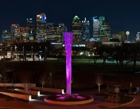 Dallas Uptown skyline with purple lit tower